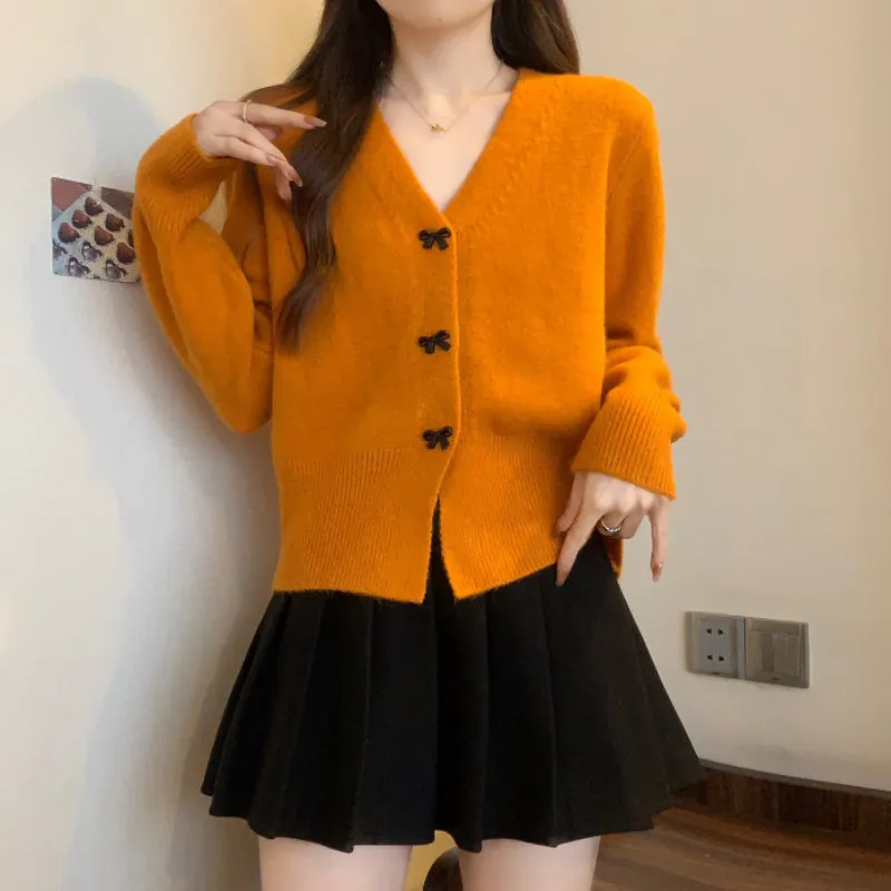 XIEYINSHE Korean version of V-neck fashion loose solid color knitted cardigan women's New autumn and winter new bow thin short sweater