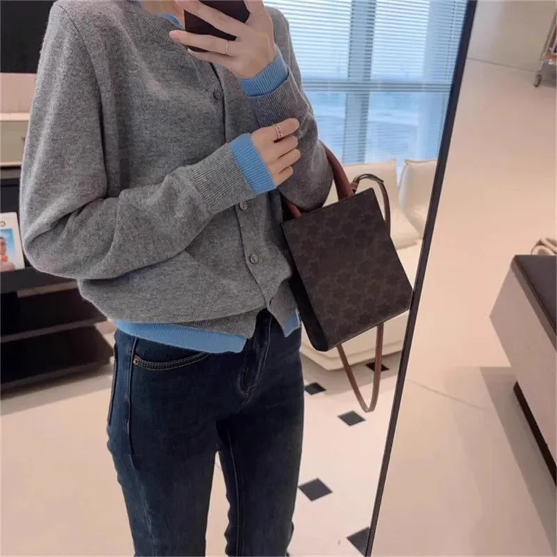 XIEYINSHE New autumn and winter new gray fake two-piece knitted cardigan women's Korean simple versatile and thin crew neck sweater outer wear