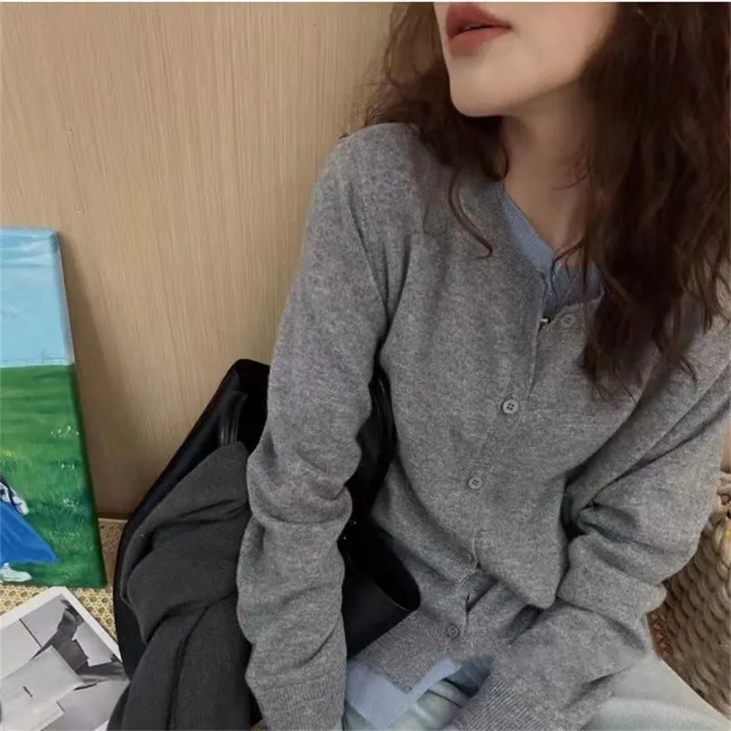 XIEYINSHE New autumn and winter new gray fake two-piece knitted cardigan women's Korean simple versatile and thin crew neck sweater outer wear
