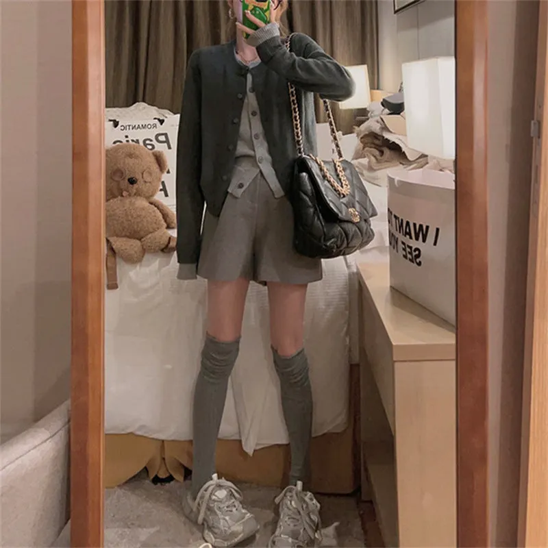 XIEYINSHE New autumn and winter new gray fake two-piece knitted cardigan women's Korean simple versatile and thin crew neck sweater outer wear